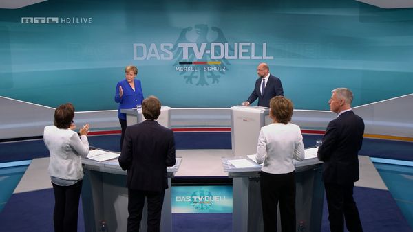 A screen that shows the TV debate between German Chancellor Angela Merkel of the Christian Democratic Union (CDU) and her challenger Germany's Social Democratic Party SPD candidate for chancellor Martin Schulz in Berlin, Germany, September 3, 2017. A screen that shows the TV debate between German Chancellor Angela Merkel of the Christian Democratic Union (CDU) and her challenger Germany's Social Democratic Party SPD candidate for chancellor Martin Schulz in Berlin, Germany, September 3, 2017. - Sputnik International