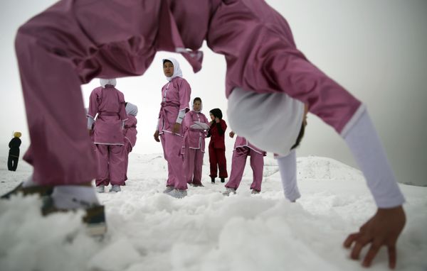 Shaolin martial arts student strikes a pose in the snow, in Kabul, Afghanistan Shaolin martial arts student strikes a pose in the snow, in Kabul, Afghanistan - Sputnik International