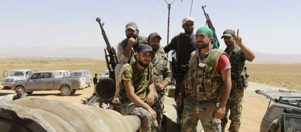 Syrian army fighters stand guard in the Qara area, in Syria's Qalamoun region (File) Syrian army fighters stand guard in the Qara area, in Syria's Qalamoun region (File) - Sputnik International