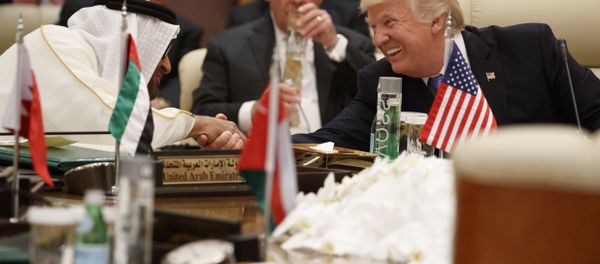 US President Donald Trump shakes hands with Abu Dhabi's Crown Prince Mohammed bin Zayed Al Nahyan during a meeting with leaders at the Gulf Cooperation Council Summit, at the King Abdulaziz Conference Center, Sunday, May 21, 2017, in Riyadh, Saudi Arabia. US President Donald Trump shakes hands with Abu Dhabi's Crown Prince Mohammed bin Zayed Al Nahyan during a meeting with leaders at the Gulf Cooperation Council Summit, at the King Abdulaziz Conference Center, Sunday, May 21, 2017, in Riyadh, Saudi Arabia. - Sputnik International