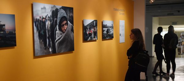 At the exhibition of Andrei Stenin International Press Photo Contest finalists' works at the Lumiere Brothers Center for Photography in Moscow At the exhibition of Andrei Stenin International Press Photo Contest finalists' works at the Lumiere Brothers Center for Photography in Moscow - Sputnik International