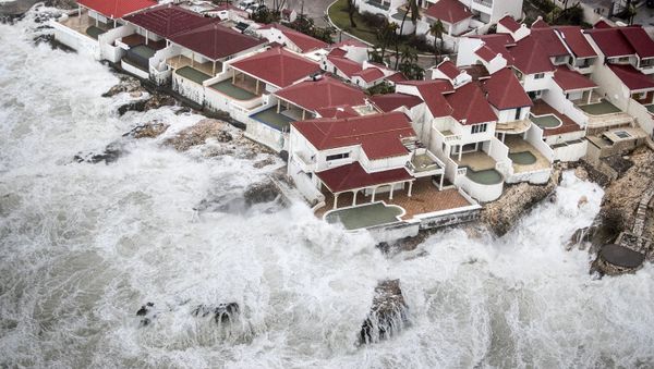 This Sept. 6, 2017 photo provided by the Dutch Defense Ministry shows a few of the homes that remained intact in the aftermath of Hurricane Irma, in St. Maarten. Irma cut a path of devastation across the northern Caribbean, leaving thousands homeless after destroying buildings and uprooting trees. - Sputnik International