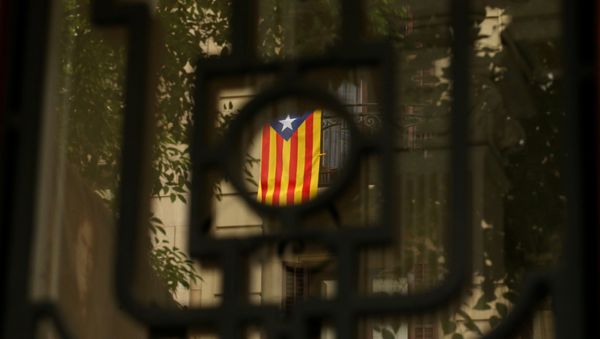 An Estelada (Catalan separatist flag) hangs on a balcony in Barcelona, Spain, September 7, 2017 An Estelada (Catalan separatist flag) hangs on a balcony in Barcelona, Spain, September 7, 2017 - Sputnik International