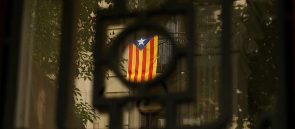 An Estelada (Catalan separatist flag) hangs on a balcony in Barcelona, Spain, September 7, 2017 An Estelada (Catalan separatist flag) hangs on a balcony in Barcelona, Spain, September 7, 2017 - Sputnik International