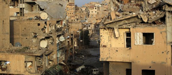 A view shows damaged buildings in Deir al-Zor, eastern Syria February 19, 2014 A view shows damaged buildings in Deir al-Zor, eastern Syria February 19, 2014 - Sputnik International