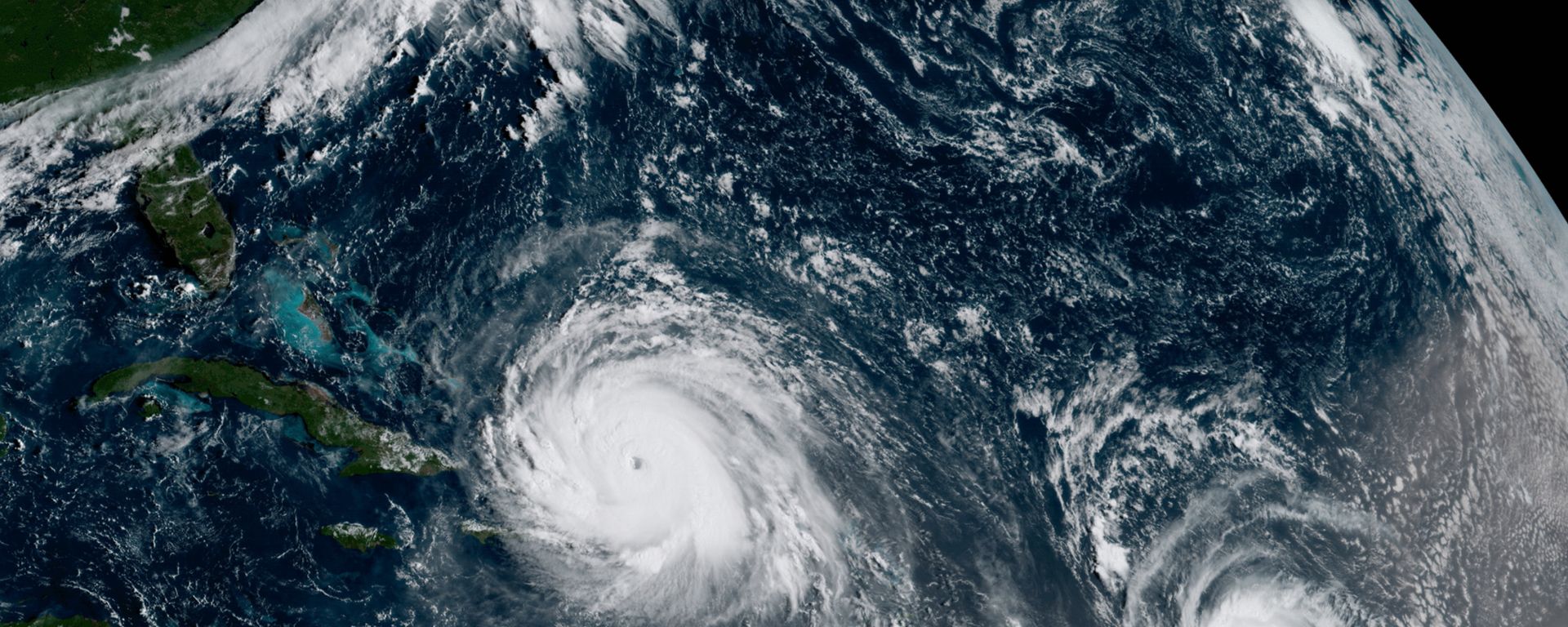 In this GOES-16 geocolor image satellite image taken Thursday, Sept. 7, 2017, the eye of Hurricane Irma, left, is just north of the island of Hispaniola, with Hurricane Jose, right, in the Atlantic Ocean In this GOES-16 geocolor image satellite image taken Thursday, Sept. 7, 2017, the eye of Hurricane Irma, left, is just north of the island of Hispaniola, with Hurricane Jose, right, in the Atlantic Ocean - Sputnik International, 1920, 02.10.2023