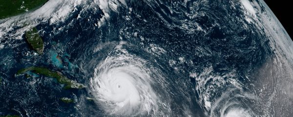 In this GOES-16 geocolor image satellite image taken Thursday, Sept. 7, 2017, the eye of Hurricane Irma, left, is just north of the island of Hispaniola, with Hurricane Jose, right, in the Atlantic Ocean In this GOES-16 geocolor image satellite image taken Thursday, Sept. 7, 2017, the eye of Hurricane Irma, left, is just north of the island of Hispaniola, with Hurricane Jose, right, in the Atlantic Ocean - Sputnik International