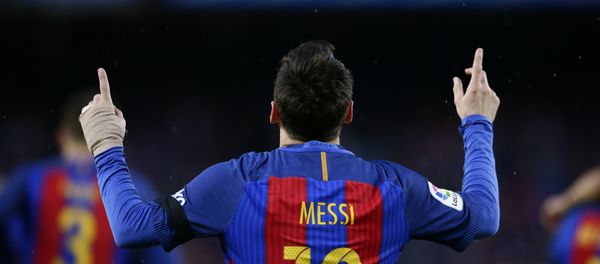 FC Barcelona's Lionel Messi celebrates after scoring during the Spanish La Liga soccer match between FC Barcelona and Sevilla at the Camp Nou stadium in Barcelona, Spain, Wednesday, April 5, 2017 FC Barcelona's Lionel Messi celebrates after scoring during the Spanish La Liga soccer match between FC Barcelona and Sevilla at the Camp Nou stadium in Barcelona, Spain, Wednesday, April 5, 2017 - Sputnik International