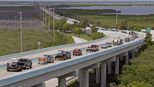 Motorists head north of Key Largo, Fla., on US 1, in anticipation of Hurricane Irma, Wednesday, Sept. 6, 2017 Motorists head north of Key Largo, Fla., on US 1, in anticipation of Hurricane Irma, Wednesday, Sept. 6, 2017 - Sputnik International