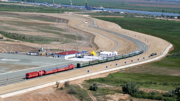 Train operation starting on the Yandyki-Olya railroad stretch, crossing the Astrakhan Region. It is part of the North-South transnational transport corridor, which will link Russia with Iran, India and Southeast Asia (File) - Sputnik International