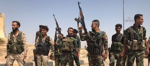 Troops of the Syrian 5th Army Corps join Syrian Army units in the south of Deir ez-Zor following the breaking of the ISIL blockade at the main entrance to the city in the south. File photo Troops of the Syrian 5th Army Corps join Syrian Army units in the south of Deir ez-Zor following the breaking of the ISIL blockade at the main entrance to the city in the south. File photo - Sputnik International