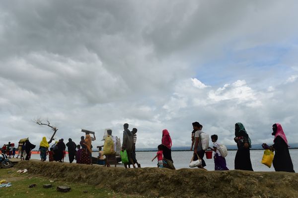 Rohingya Muslim refugees arrive from Myanmar after crossing the Naf river in the Bangladeshi town of Teknaf Rohingya Muslim refugees arrive from Myanmar after crossing the Naf river in the Bangladeshi town of Teknaf - Sputnik International