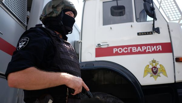 A staff member of the Special Purpose Police Unit of the Russian National Guard Main Administration - Sputnik International