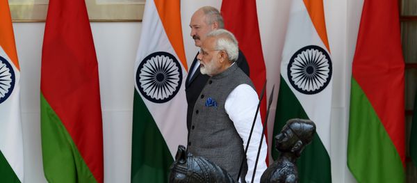 Indian Prime Minister Narendra Modi (R) walks with President of Belarus Alexander Lukashenko before their meeting in New Delhi on September 12, 2017 Indian Prime Minister Narendra Modi (R) walks with President of Belarus Alexander Lukashenko before their meeting in New Delhi on September 12, 2017 - Sputnik International