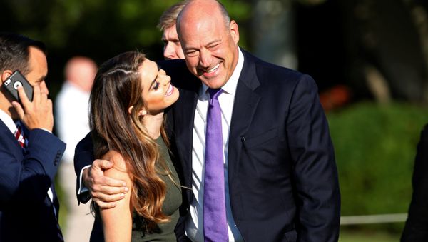 Trump's communication director Hope Hicks and Trump's economic adviser Gary Cohn speak before observing a moment of silence in remembrance of those lost in the 9/11 attacks at the White House in Washington, U.S. September 11, 2017 - Sputnik International