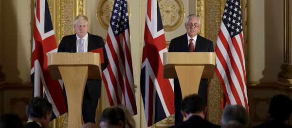 Britain's Foreign minister Boris Johnson and US Secretary of State Rex Tillerson take part in a joint press conference after their meeting on Libya, at Lancaster House in London - Sputnik International
