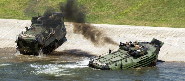 This Sept. 6, 2016, photo released by the U.S. Marine Corps shows Marines with the 2nd Amphibious Assault Battalion aboard AAV-7 Amphibious Assault vehicles during an exercise on the Cumberland River in Nashville, Tenn. This Sept. 6, 2016, photo released by the U.S. Marine Corps shows Marines with the 2nd Amphibious Assault Battalion aboard AAV-7 Amphibious Assault vehicles during an exercise on the Cumberland River in Nashville, Tenn. - Sputnik International