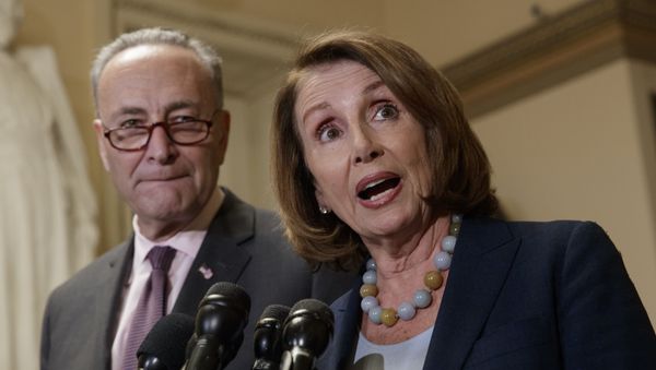 House Democratic Leader Nancy Pelosi of California, and Senate Democratic Leader Chuck Schumer of New York speak to reporters about the Congressional Budget Office projection that 14 million people would lose health coverage under the House Republican bill dismantling former President Barack Obama's health care law, on Capitol Hill in Washington, Monday, March, 13, 2017. House Democratic Leader Nancy Pelosi of California, and Senate Democratic Leader Chuck Schumer of New York speak to reporters about the Congressional Budget Office projection that 14 million people would lose health coverage under the House Republican bill dismantling former President Barack Obama's health care law, on Capitol Hill in Washington, Monday, March, 13, 2017. - Sputnik International