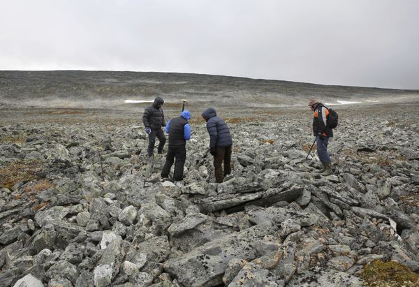 In this photo taken on Sept. 4, 2017, archeologists and the two hunters who found an ancient Viking sword, search the site where it was discovered on a mountain top 1,640 meters (1 mile) above sea level in Lesja, some 275 kilometers (170 miles) north of Oslo. Archeologist Lars Holger Piloe said the sword's preservation was likely due to the quality of the iron, as well as the cold, dry conditions. In this photo taken on Sept. 4, 2017, archeologists and the two hunters who found an ancient Viking sword, search the site where it was discovered on a mountain top 1,640 meters (1 mile) above sea level in Lesja, some 275 kilometers (170 miles) north of Oslo. Archeologist Lars Holger Piloe said the sword's preservation was likely due to the quality of the iron, as well as the cold, dry conditions. - Sputnik International