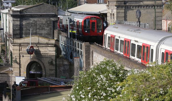 Members of the emergency services work alongside an underground tube train at a platform at Parsons Green underground tube station in west London on September 15, 2017, following an incident on an underground tube carriage at the station Members of the emergency services work alongside an underground tube train at a platform at Parsons Green underground tube station in west London on September 15, 2017, following an incident on an underground tube carriage at the station - Sputnik International