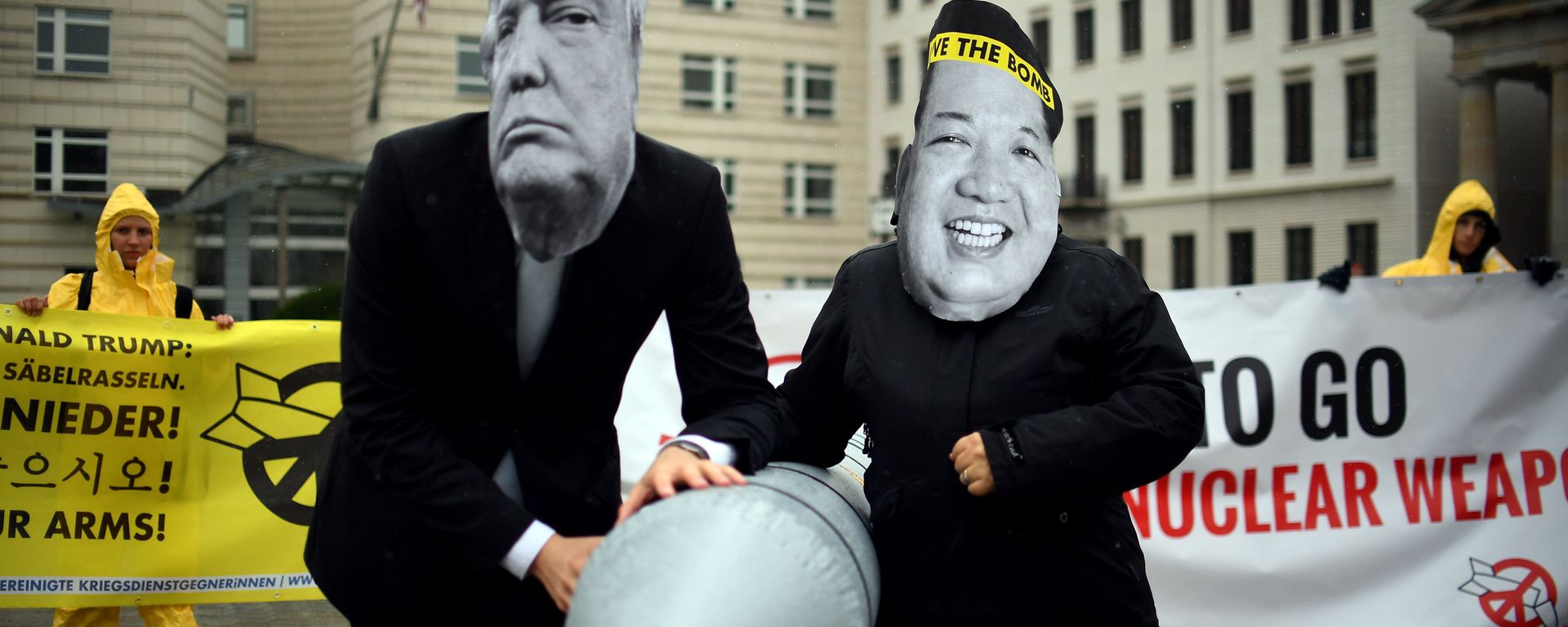 Activists of the non-governmental organization International Campaign to Abolish Nuclear Weapons (ICAN) wear masks of US President Donal Trump and leader of the Democratic People's Republic of Korea Kim Jon-un while posing with a mock missile in front of the embassy of Democratic People's Republic of Korea in Berlin, on September 13, 2017 Activists of the non-governmental organization International Campaign to Abolish Nuclear Weapons (ICAN) wear masks of US President Donal Trump and leader of the Democratic People's Republic of Korea Kim Jon-un while posing with a mock missile in front of the embassy of Democratic People's Republic of Korea in Berlin, on September 13, 2017 - Sputnik International, 1920, 16.09.2017