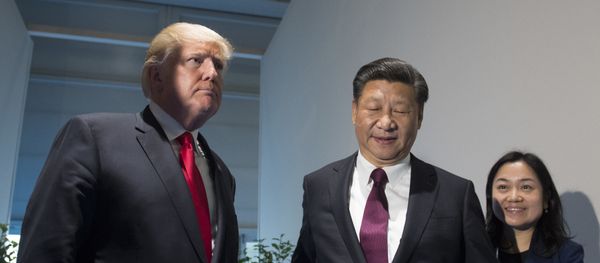US President Donald Trump and Chinese President Xi Jinping, right, arrive for a meeting on the sidelines of the G-20 Summit in Hamburg, Germany, Saturday, July 8, 2017 - Sputnik International