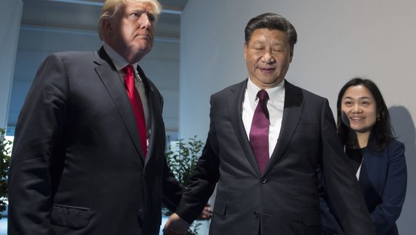 US President Donald Trump and Chinese President Xi Jinping, right, arrive for a meeting on the sidelines of the G-20 Summit in Hamburg, Germany, Saturday, July 8, 2017 - Sputnik International