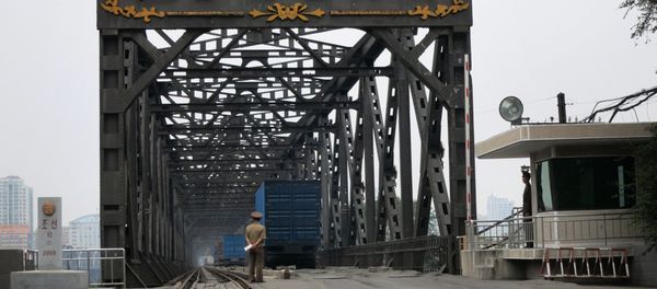 Korea China Friendship Bridge - an old bridge connecting the two socialist states over the Yalu River Korea China Friendship Bridge - an old bridge connecting the two socialist states over the Yalu River - Sputnik International