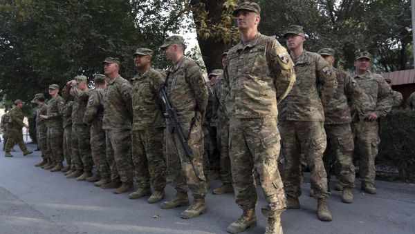 US and NATO soldiers take part in a ceremony to commemorate the Sept. 11, 2001, attack on the World Trade Center in New York, in Resolute Support 'Green Zone' headquarters of Kabul, Afghanistan, Monday, Sept. 11, 2017 - Sputnik International
