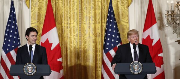 President Donald Trump and Canadian Prime Minister Justin Trudeau participate in a joint news conference in the East Room of the White House in Washington, Monday, Feb. 13, 2017. - Sputnik International