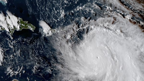 This Monday, Sept. 18, 2017, GOES East satellite image provided by NASA taken at 20:30 UTC, shows the eye of Hurricane Maria as it nears Dominica - Sputnik International