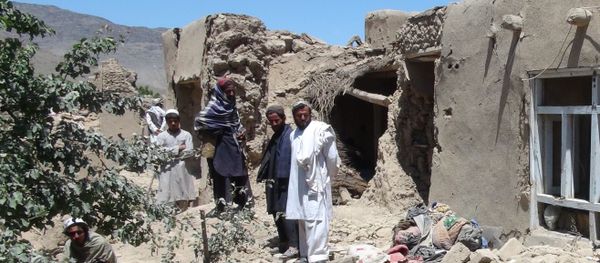 Afghan villagers gather near a destroyed house in Logar province, south of Kabul, Afghanistan (File) - Sputnik International