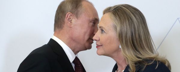 File photo taken on Saturday, Sept. 8, 2012, Russian President Vladimir Putin, left, meets U.S. Secretary of State Hillary Rodham Clinton on her arrival at the APEC summit in Vladivostok, Russia. - Sputnik International