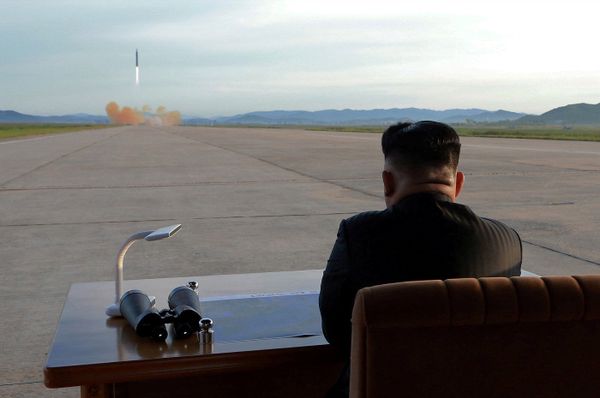 North Korean leader Kim Jong Un watches the launch of a Hwasong-12 missile in this undated photo released by North Korea's Korean Central News Agency (KCNA) on September 16, 2017 - Sputnik International