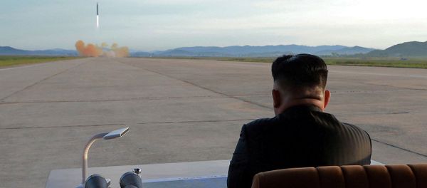 North Korean leader Kim Jong Un watches the launch of a Hwasong-12 missile in this undated photo released by North Korea's Korean Central News Agency (KCNA) on September 16, 2017 North Korean leader Kim Jong Un watches the launch of a Hwasong-12 missile in this undated photo released by North Korea's Korean Central News Agency (KCNA) on September 16, 2017 - Sputnik International