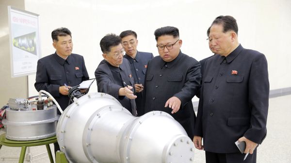 This undated file photo distributed on Sunday, Sept. 3, 2017, by the North Korean government, shows North Korean leader Kim Jong Un, second from right, at an undisclosed location in North Korea This undated file photo distributed on Sunday, Sept. 3, 2017, by the North Korean government, shows North Korean leader Kim Jong Un, second from right, at an undisclosed location in North Korea - Sputnik International