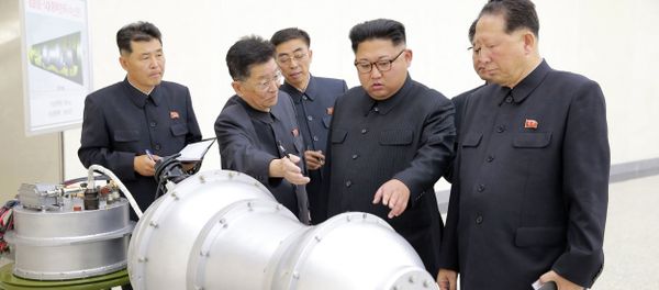 This undated file photo distributed on Sunday, Sept. 3, 2017, by the North Korean government, shows North Korean leader Kim Jong Un, second from right, at an undisclosed location in North Korea This undated file photo distributed on Sunday, Sept. 3, 2017, by the North Korean government, shows North Korean leader Kim Jong Un, second from right, at an undisclosed location in North Korea - Sputnik International
