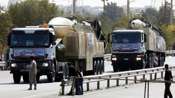 The new Iranian long range missile Khoramshahr (front) is displayed during the annual military parade marking the anniversary of the outbreak of its devastating 1980-1988 war with Saddam Hussein's Iraq, on September 22,2017 in Tehran - Sputnik International