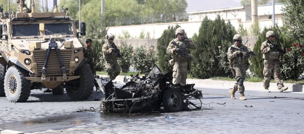 U.S. and Afghan security forces inspect the site of a suicide attack on NATO convoy in Kabul, Afghanistan, Sunday, Sept. 24, 2017 U.S. and Afghan security forces inspect the site of a suicide attack on NATO convoy in Kabul, Afghanistan, Sunday, Sept. 24, 2017 - Sputnik International