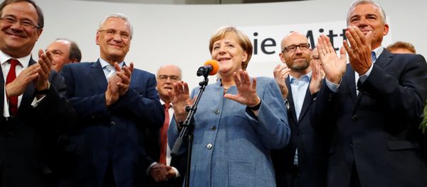 Christian Democratic Union CDU party leader and German Chancellor Angela Merkel reacts after winning the German general election (Bundestagswahl) in Berlin, Germany, September 24, 2017 Christian Democratic Union CDU party leader and German Chancellor Angela Merkel reacts after winning the German general election (Bundestagswahl) in Berlin, Germany, September 24, 2017 - Sputnik International