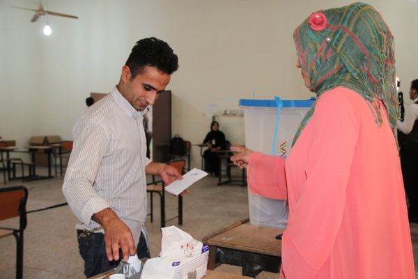 Voting at a polling station in the city of Kirkuk during an independence referendum for Iraqi Kurdistan Voting at a polling station in the city of Kirkuk during an independence referendum for Iraqi Kurdistan - Sputnik International