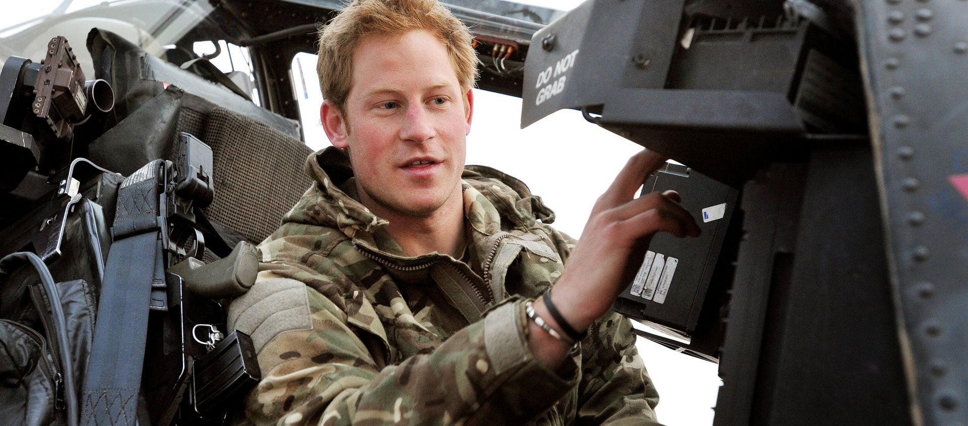 In this photo taken Dec. 12, 2012, made available Monday Jan. 21, 2013 of Britain's Prince Harry or just plain Captain Wales as he is known in the British Army, makes his early morning pre-flight checks on the flight-line, from Camp Bastion southern Afghanistan. In this photo taken Dec. 12, 2012, made available Monday Jan. 21, 2013 of Britain's Prince Harry or just plain Captain Wales as he is known in the British Army, makes his early morning pre-flight checks on the flight-line, from Camp Bastion southern Afghanistan. - Sputnik International, 1920, 19.08.2021