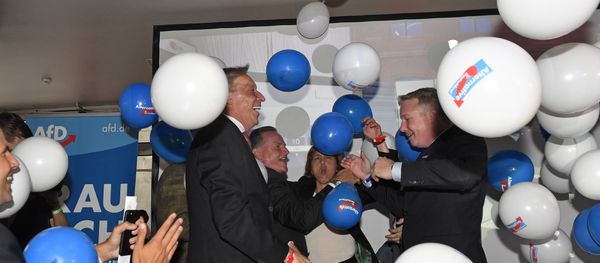 AfD board members celebrate with baloons during the election party of the nationalist 'Alternative for Germany', AfD, in Berlin, Germany, Sunday, Sept. 24, 2017, after the polling stations for the German parliament elections had been closed AfD board members celebrate with baloons during the election party of the nationalist 'Alternative for Germany', AfD, in Berlin, Germany, Sunday, Sept. 24, 2017, after the polling stations for the German parliament elections had been closed - Sputnik International