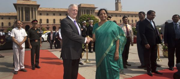 Indian Defense Minister Nirmala Sitharaman, center right, shakes hands with U.S. Defense Secretary Jim Mattis center, upon his arrival at the Defense Ministry office, in New Delhi, India, Tuesday, Sept. 26, 2017 Indian Defense Minister Nirmala Sitharaman, center right, shakes hands with U.S. Defense Secretary Jim Mattis center, upon his arrival at the Defense Ministry office, in New Delhi, India, Tuesday, Sept. 26, 2017 - Sputnik International