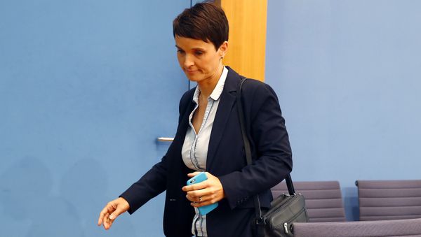 Frauke Petry, chairwoman of the anti-immigration party Alternative fuer Deutschland (AfD) leaves a news conference in Berlin, Germany - Sputnik International
