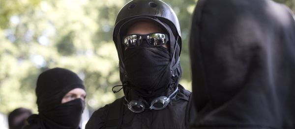 Antifa protesters wear bandanas over their face during a protest to oppose the right wing group The Patriot Prayer Movement, that was having a rally in downtown Portland, Oregon on September 10, 2017. Antifa protesters wear bandanas over their face during a protest to oppose the right wing group The Patriot Prayer Movement, that was having a rally in downtown Portland, Oregon on September 10, 2017. - Sputnik International