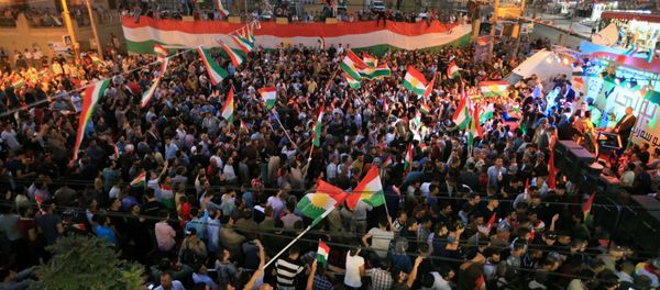 Kurds celebrate to show their support for the independence referendum in Duhok, Iraq - Sputnik International