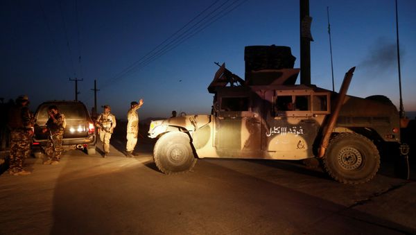 Afghan security forces keep watch at the site of an attack and gun fire between insurgents and Afghan forces in Kabul - Sputnik International
