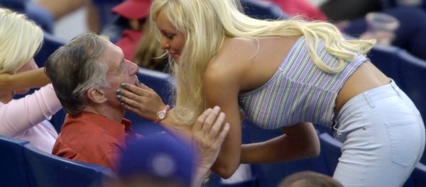 Hugh Hefner, founder of Playboy magazine, left, chats with a Playboy playmate Hugh Hefner, founder of Playboy magazine, left, chats with a Playboy playmate - Sputnik International