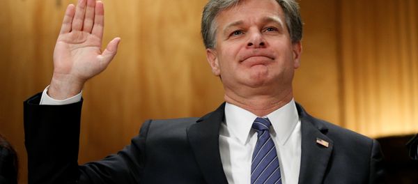 FBI Director Christopher Wray is sworn in to testify before a Senate Committee on Homeland Security and Governmental Affairs during a hearing on Threats to the homeland on Capitol Hill in Washington, US, September 27, 2017. - Sputnik International